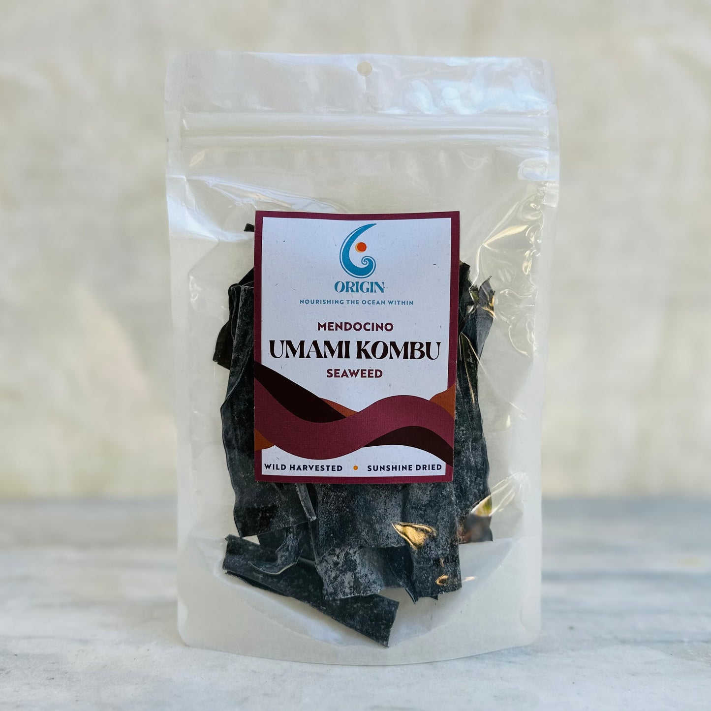 origin seaweed wild dried umami kombu in a clear compostable bag